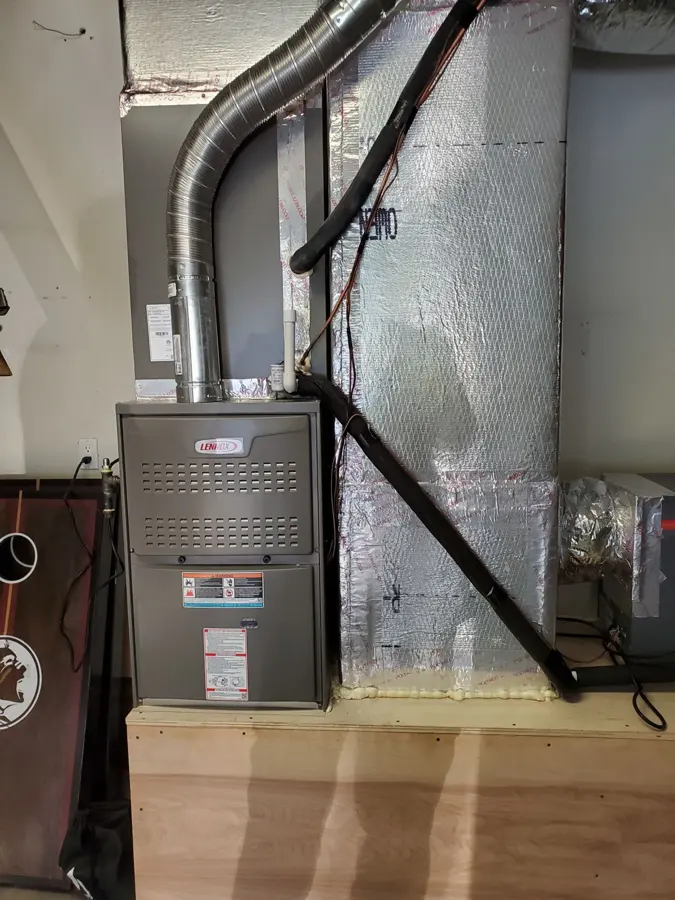 Furnace and ductwork in a utility space