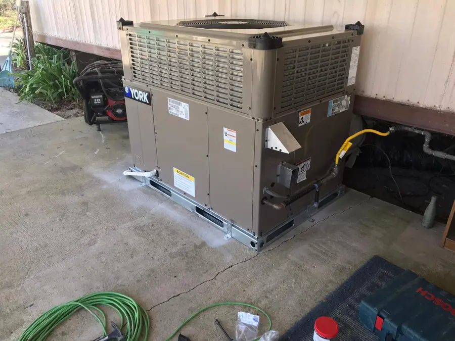 Outdoor air conditioning unit on a concrete pad